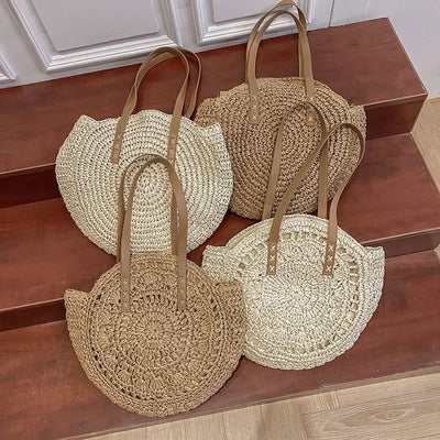 Arnora | Elegant round woven handbag with stylish faux leather straps