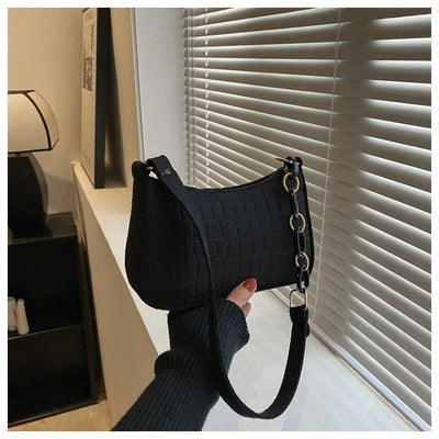 Magnella | Exclusive shoulder bag in crocodile textured design for an elegant look