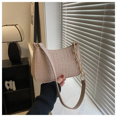 Magnella | Exclusive shoulder bag in crocodile textured design for an elegant look