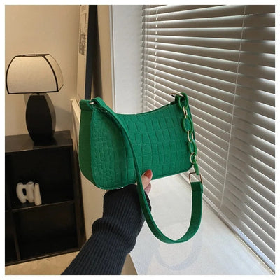 Magnella | Exclusive shoulder bag in crocodile textured design for an elegant look